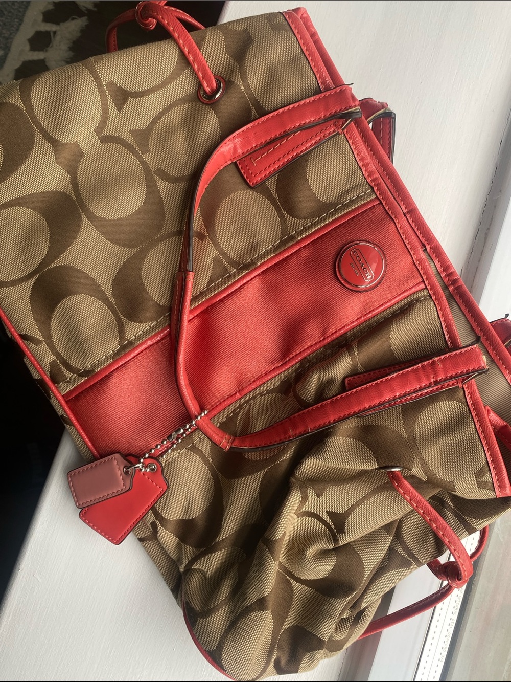 Coral and tan purse